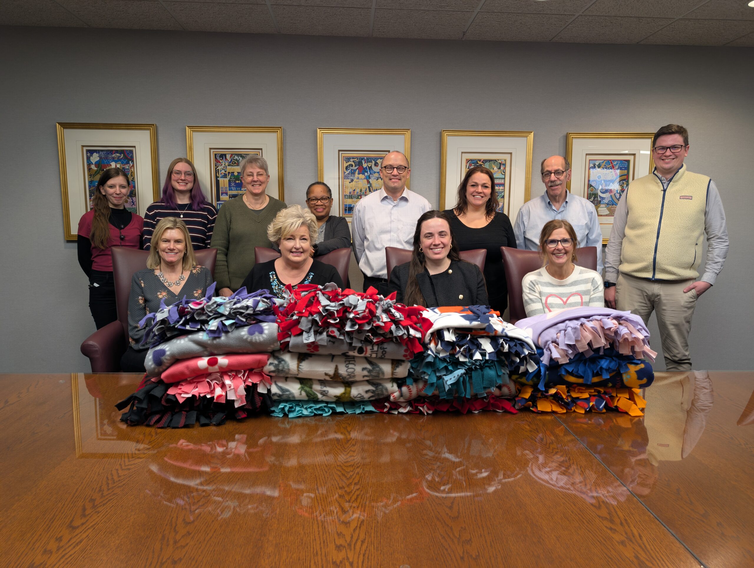 Kemp Klein Attorneys and Staff Craft No-Sew Blankets for Common Ground